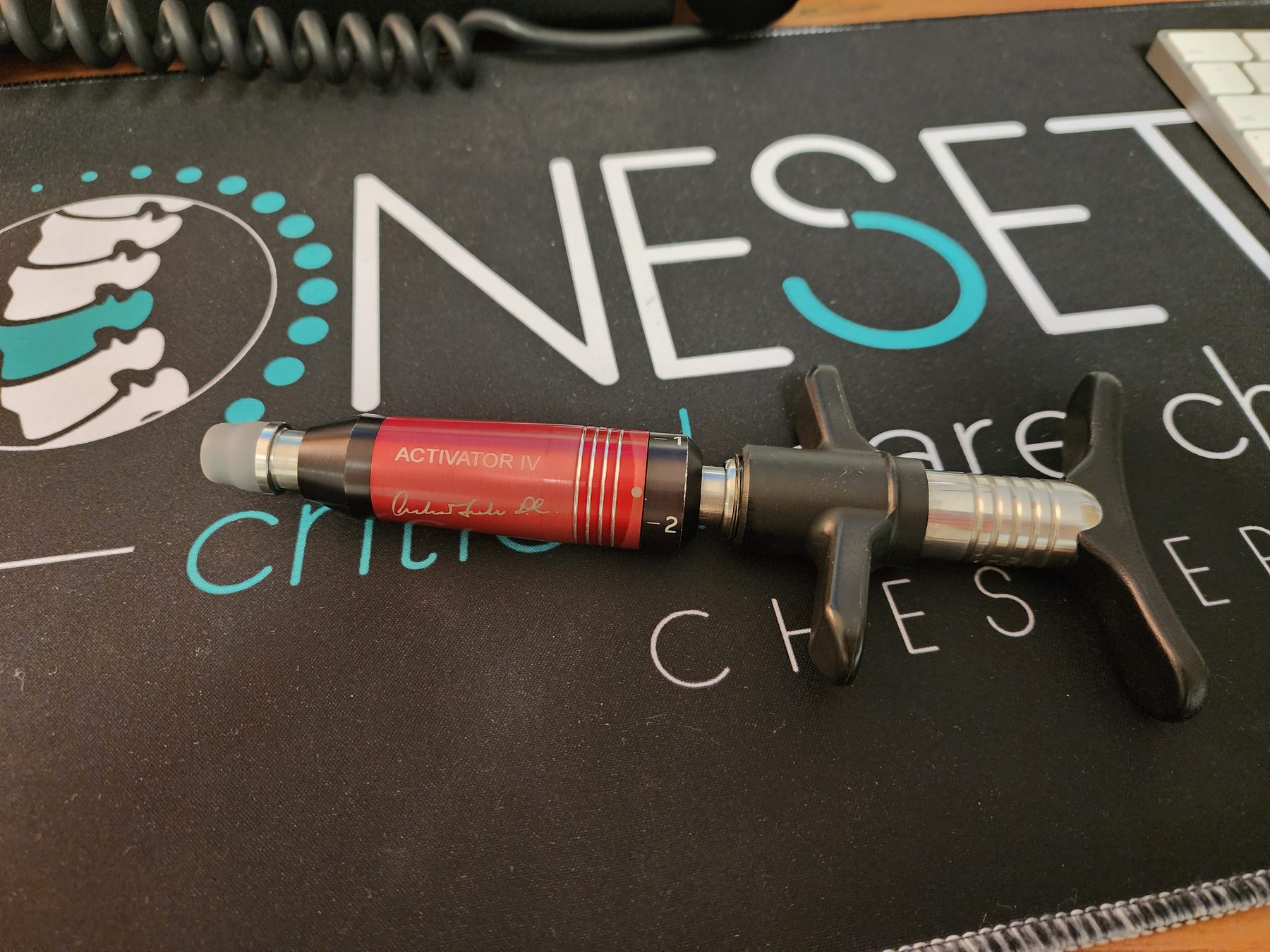 Activator IV adjusting instrument at Bonesetters Critical Care Chiropractic in Chesterfield, MO