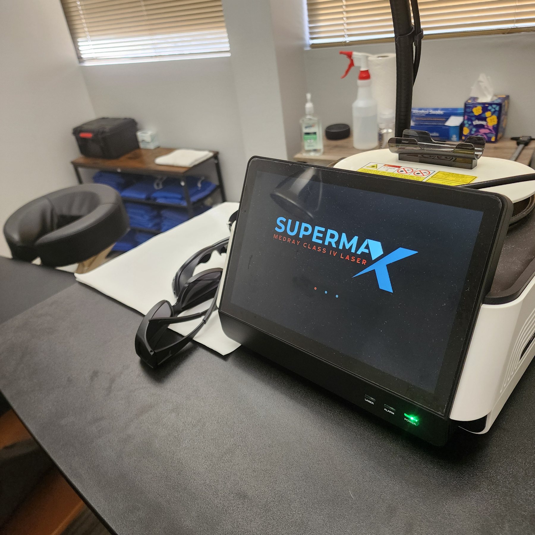 SuperMax Class IV therapy laser unit at Bonesetters Critical Care Chiropractic in Chesterfield, MO