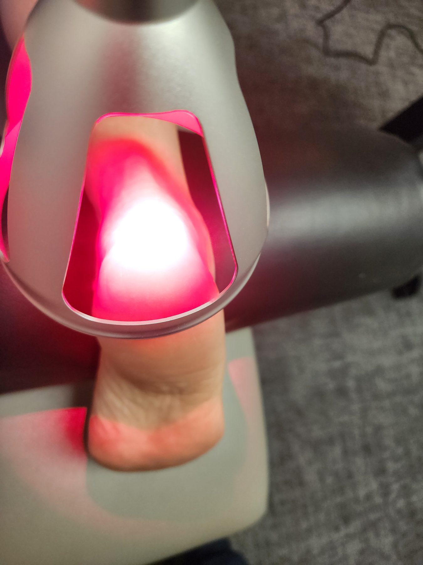 Class IV cold laser applied to a patient's foot for peripheral neuropathy at Bonesetters in Chesterfield, MO