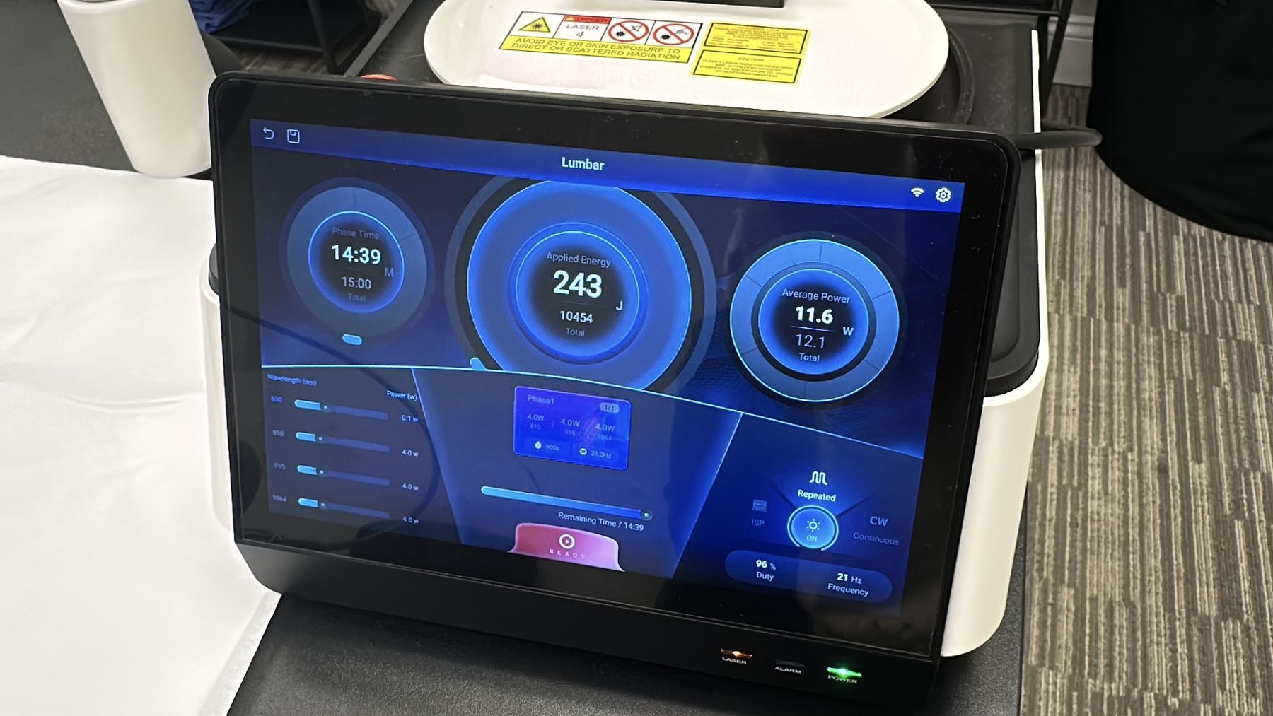 Class IV cold laser console screen showing treatment parameters at Bonesetters