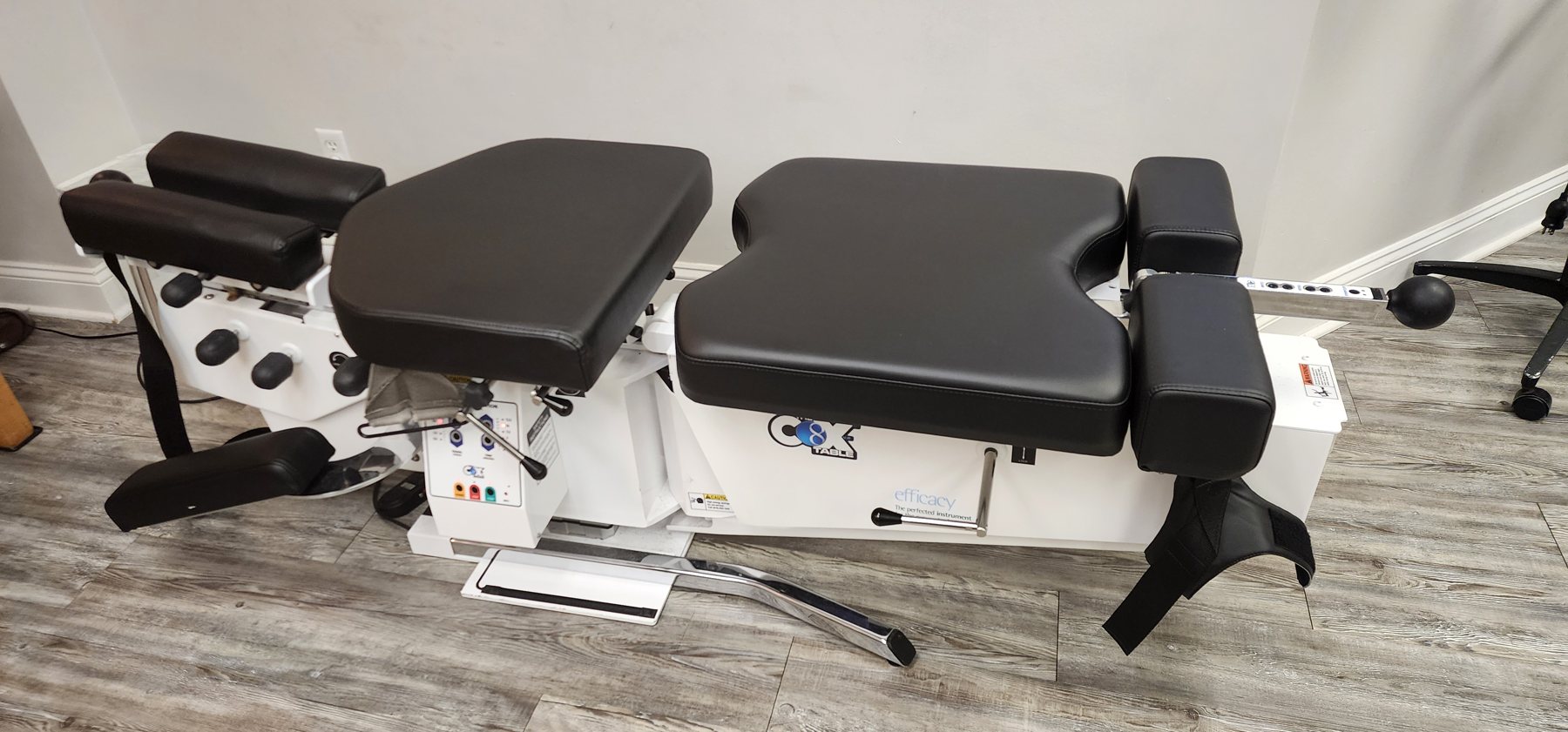 Cox 8 flexion distraction table used for gentle disc decompression
