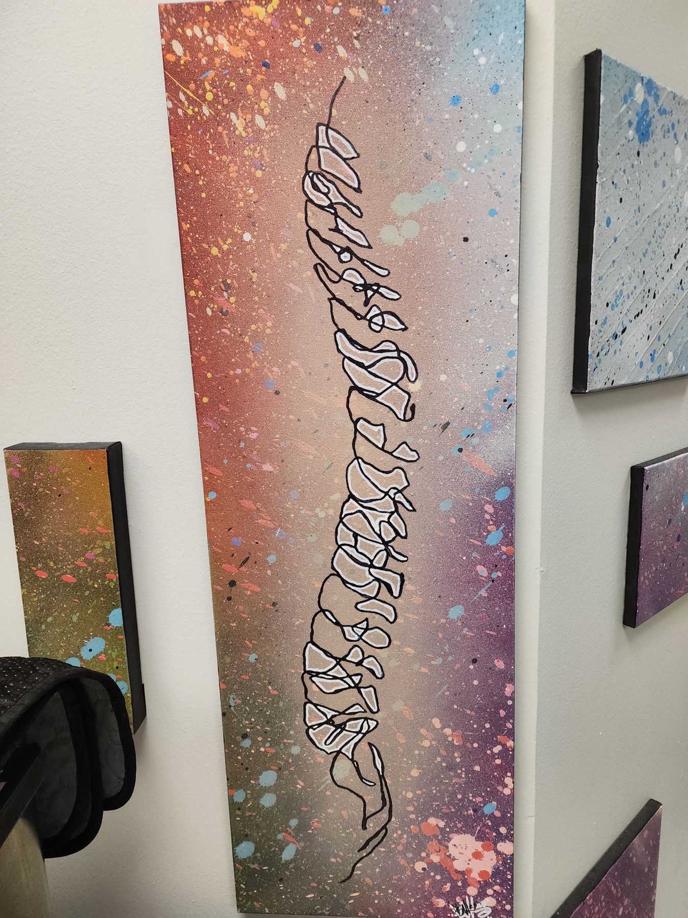 Spine anatomy artwork illustrating the cervical spine at Bonesetters in Chesterfield, MO