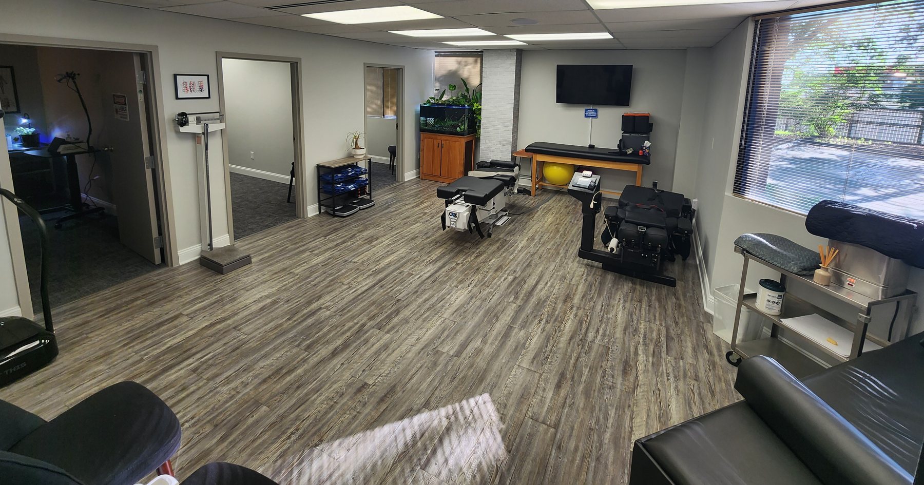 Treatment room and therapy equipment at Bonesetters Critical Care Chiropractic